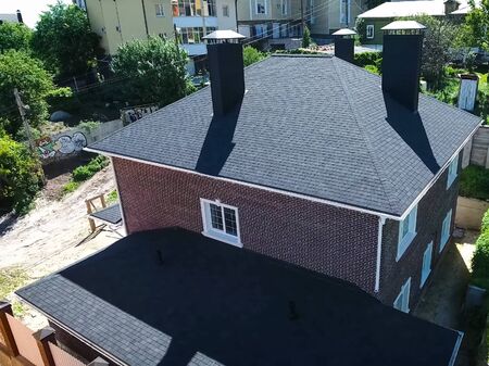 House with a roof from a bituminous tile. Bituminous tile for a roof. a roof from a bituminous tile.の写真素材