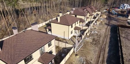 House with a roof from a bituminous tile. Bituminous tile for a roof. a roof from a bituminous tile.の写真素材