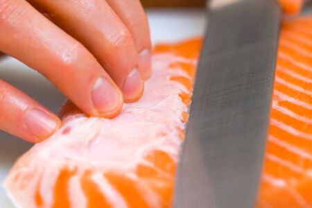 a Butchering salmon, piece of salmon red fish meat.の写真素材