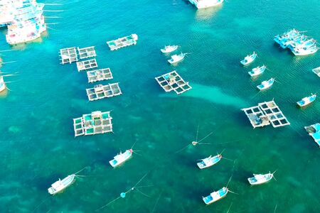 Fish farm in coastal waters. Rectangular cages for fish and crustaceans.