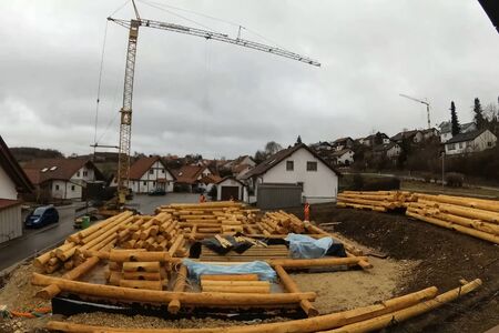 Stage of construction of a wooden house. Constructed from a wooden log house, wooden house.の写真素材