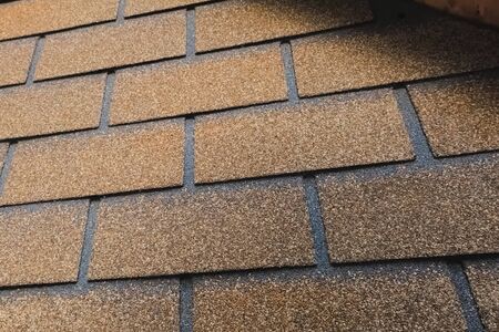 Bituminous tile for a roof. a roof from a bituminous tile.の写真素材