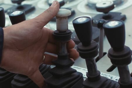 Hydraulic control levers. Drilling platform control panel.
