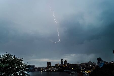 Lightning during a thunderstorm in the sky. Natural phenomenon of electricity, lightning.の写真素材