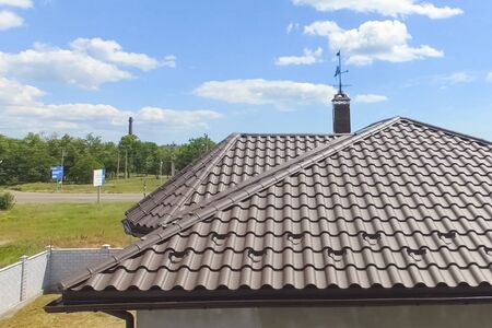 Modern roof made of metal. Corrugated metal roof and metal roofing.の写真素材