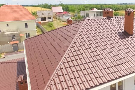 Modern roof made of metal. Corrugated metal roof and metal roofing.の写真素材