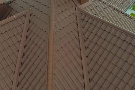 Modern roof made of metal. Corrugated metal roof and metal roofing.の写真素材