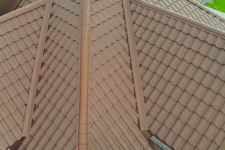 Modern roof made of metal. Corrugated metal roof and metal roofing.の写真素材