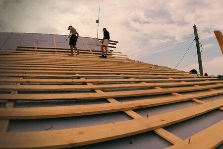 Modern roof made of metal. Corrugated metal roof and metal roofing.の写真素材