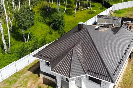 Modern roof made of metal. Corrugated metal roof and metal roofing.の写真素材