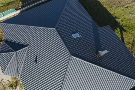 Modern roof made of metal. Corrugated metal roof and metal roofing.の写真素材