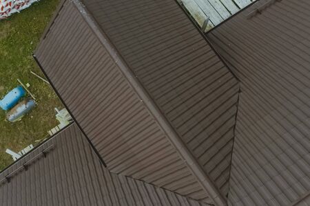 Modern roof made of metal. Corrugated metal roof and metal roofing.の写真素材
