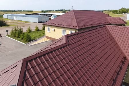 Modern roof made of metal. Corrugated metal roof and metal roofing.の写真素材