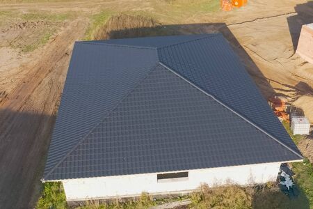 Modern roof made of metal. Corrugated metal roof and metal roofing.の写真素材