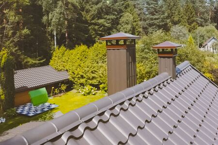 Modern roof made of metal. Corrugated metal roof and metal roofing.の写真素材