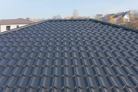 Modern roof made of metal. Corrugated metal roof and metal roofing.の写真素材