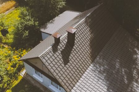 Modern roof made of metal. Corrugated metal roof and metal roofing.の写真素材