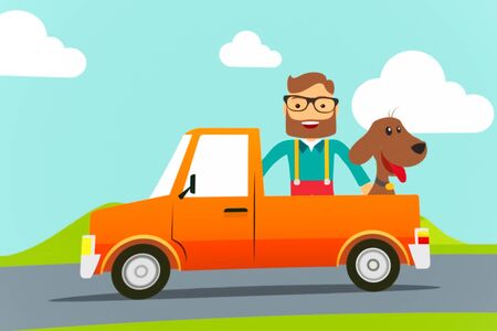 A man sits with a dog in the back of a pickup truck. Picnic ride.の写真素材