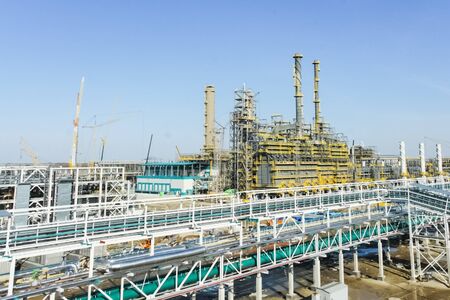 Construction of a petrochemical and oil refinery near the city of Tobolsk in Russia, workers working...