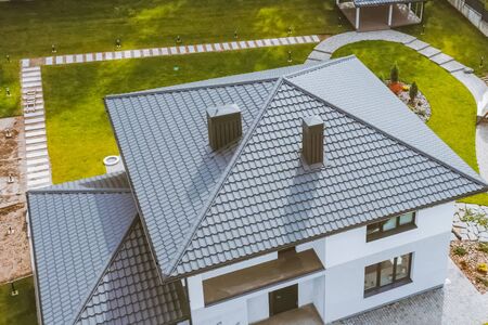 Modern roof made of metal. Corrugated metal roof and metal roofing.の写真素材