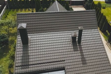 Modern roof made of metal. Corrugated metal roof and metal roofing.の写真素材