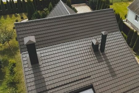 Modern roof made of metal. Corrugated metal roof and metal roofing.の写真素材