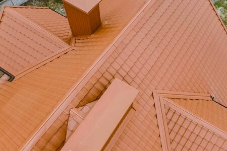Modern roof made of metal. Corrugated metal roof and metal roofing.の写真素材