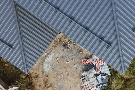 Modern roof made of metal. Corrugated metal roof and metal roofing.の写真素材