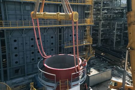 Moscow, Russia - May 17, 2018: Construction of a petrochemical plant, installation of technological equipmentの写真素材