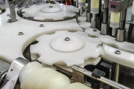 pharmaceutical equipment, line for filling and spinning cans.の写真素材