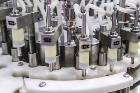 pharmaceutical equipment, line for filling and spinning cans.の写真素材