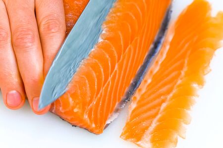 a Butchering salmon, piece of salmon red fish meat.の写真素材