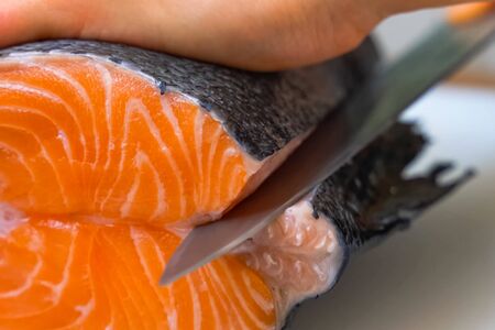 a Butchering salmon, piece of salmon red fish meat.の写真素材