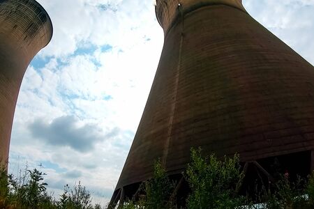 Old cooling towers of a closed nuclear power plant.の写真素材