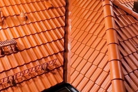 Orange ceramic tile on the roof. Roof tileの写真素材