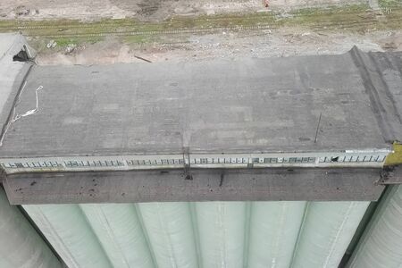 Old elevator, the destruction of the old grain terminal, the demolition of an industrial building.の写真素材
