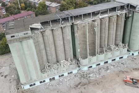 Old elevator, the destruction of the old grain terminal, the demolition of an industrial building.の写真素材