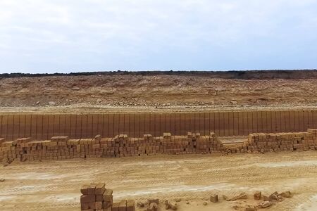 Shell quarry quarry. Cutting a seashell into blocks right away in a quarry.の写真素材