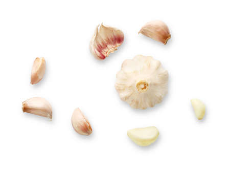 Fresh garlic bulb and cloves isolated on white background. Top view.の写真素材