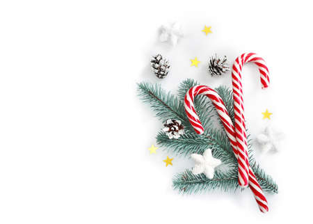 Christmas composition with candies isolated on white background. Top view.