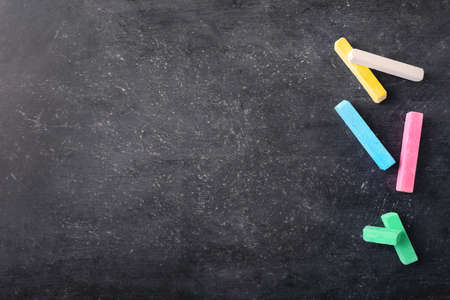 Teacher's day greeting card on black chalkboard background. Top view. Copy space.の写真素材