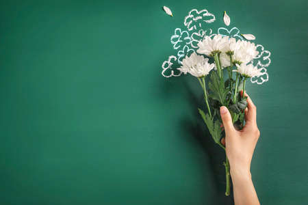 Teacher's day greeting card on green blackboard background. Copy space.の写真素材