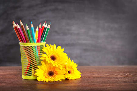 Teacher's day greeting card on black chalkboard background. Copy space.の写真素材