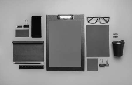 Corporate identity black stationery set on gray background. Top view.の写真素材