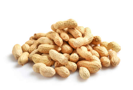 Peanuts in nutshell pile isolated on white background.