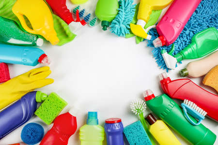 Cleaning products on white background. Home cleaning concept. Top viewの写真素材