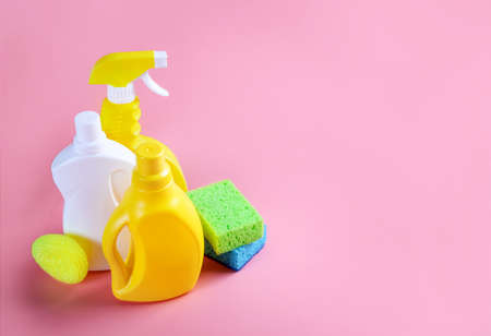 Chemical cleaning supplies on pink backgroundの写真素材