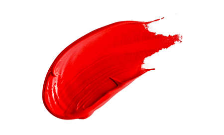 Red lipstick smear isolated on white background.の写真素材