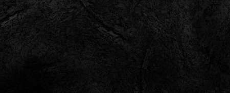 dark black stone grunge distressed cement backgroundの写真素材