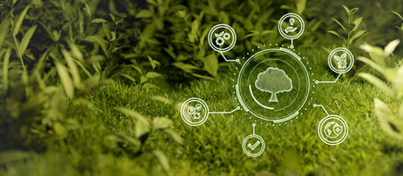 Conceptual image of cloud computing with icons against green grass in gardenの写真素材